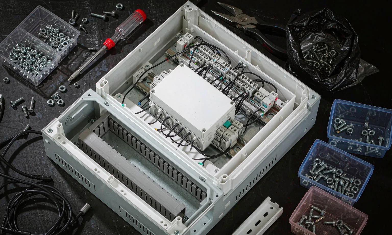 Assembling an electrical enclosure on a bench