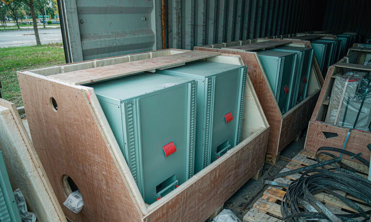 Enclosures packed in plywood crates for export