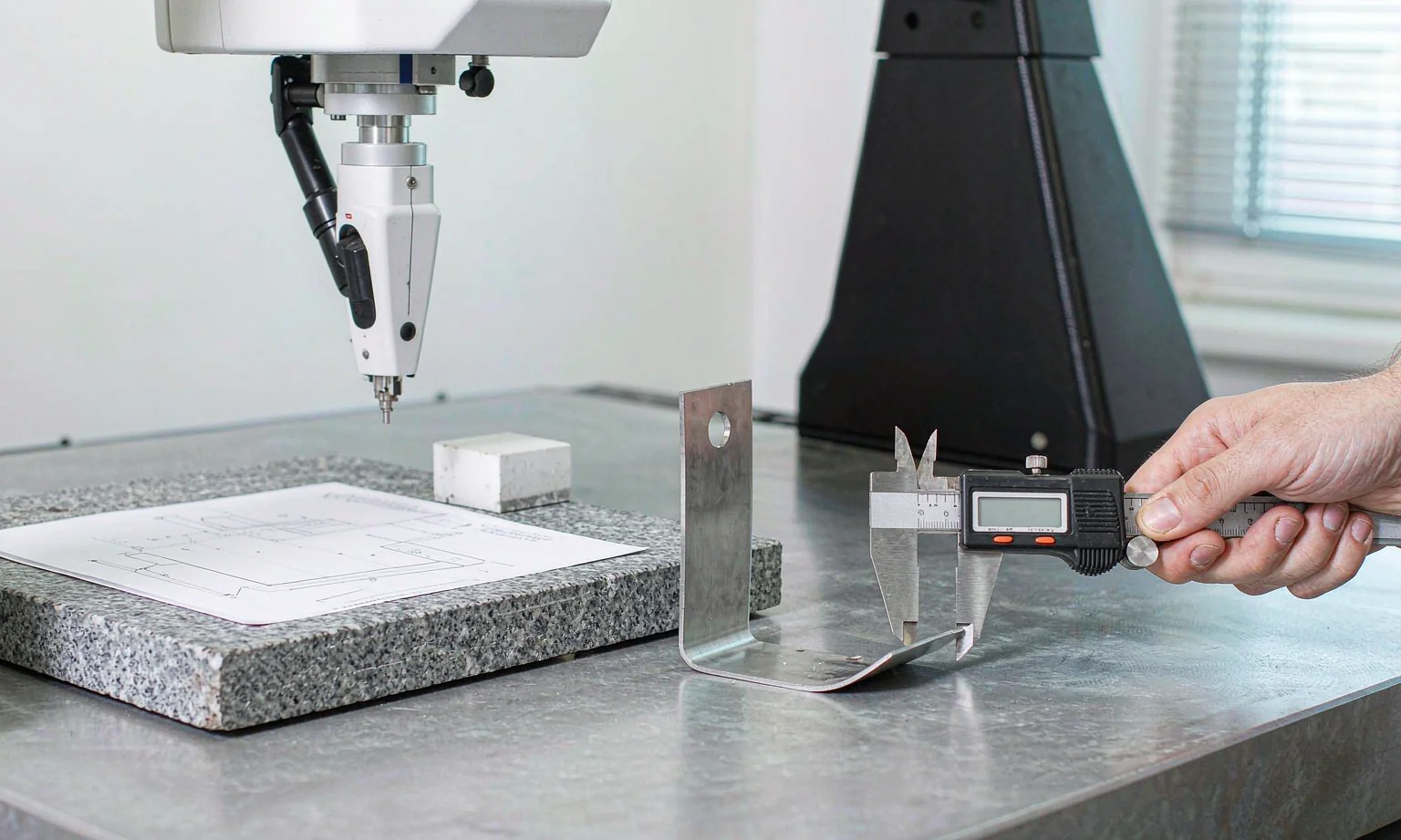 Dimensional inspection with calipers and CMM