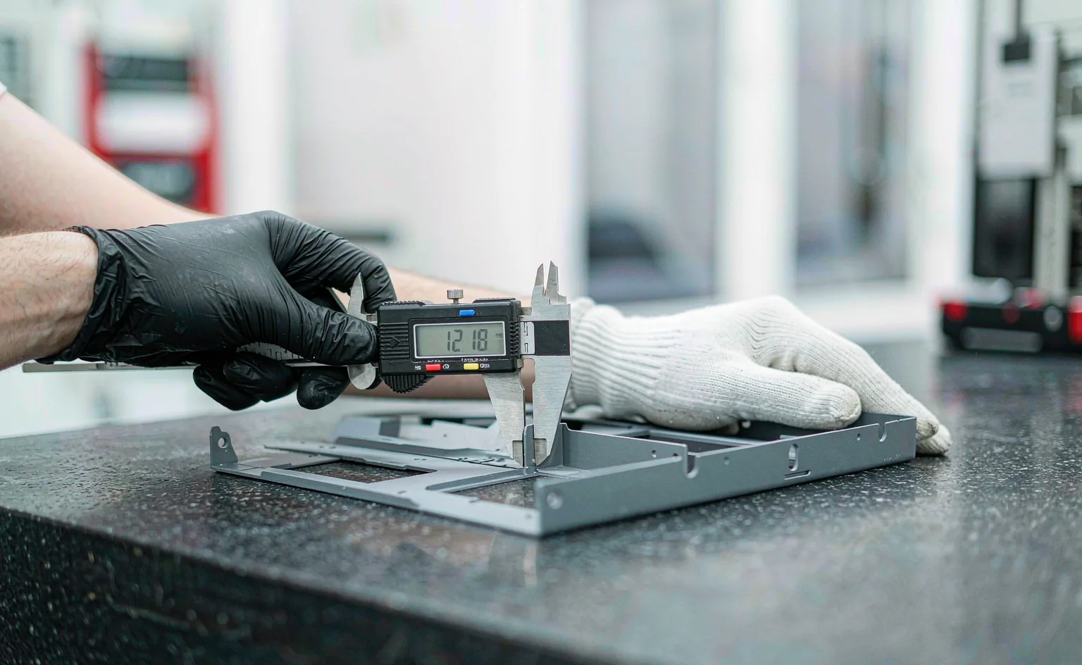 Quality inspection of sheet metal parts with a digital caliper