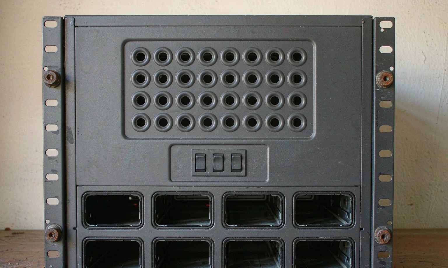 4U rack chassis front panel with punched fan vent pattern