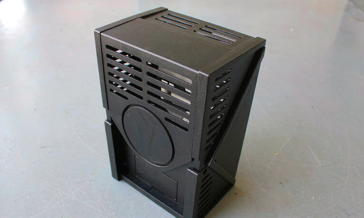Black anodized aluminium enclosure with milled ventilation slots