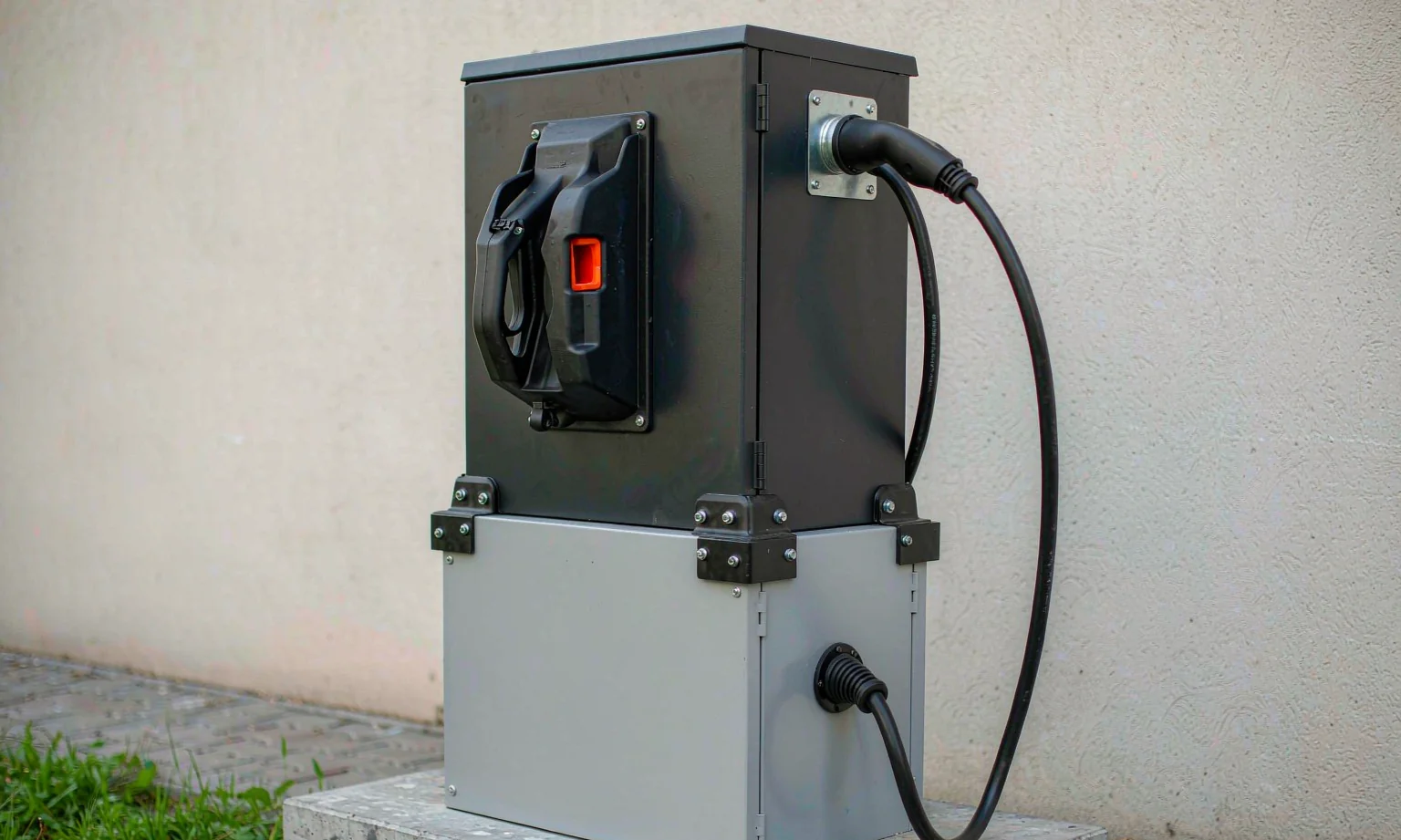Sheet metal pedestal EV charging enclosure with holster