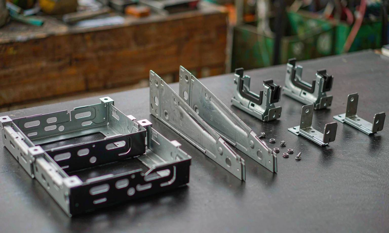 Stamped sheet metal card retainer brackets for computer chassis