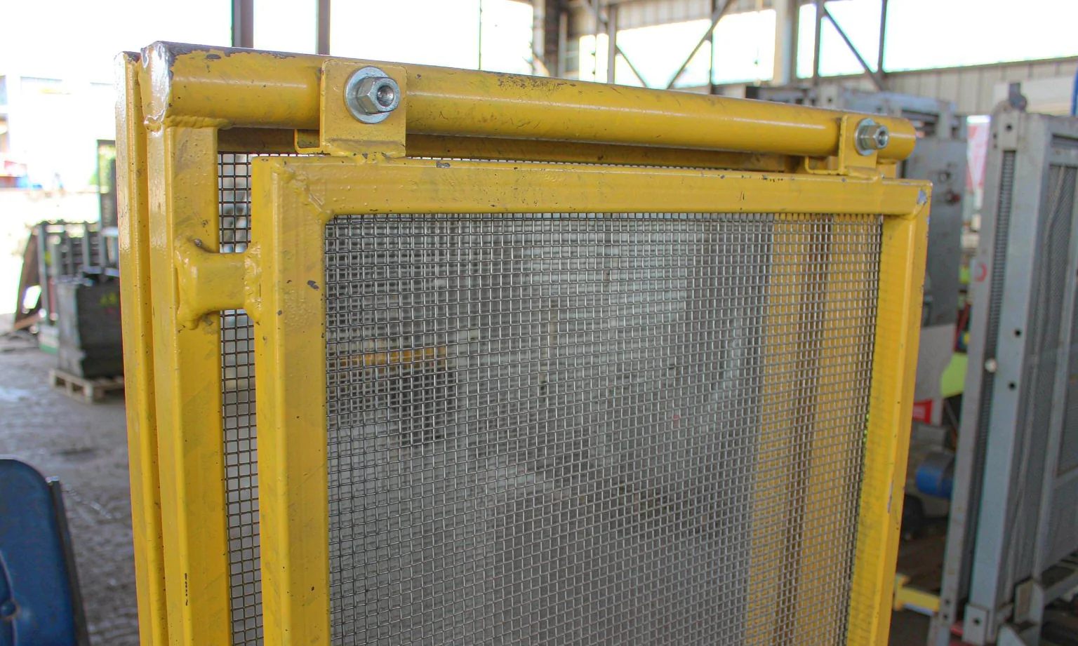 Powder-coated welded steel machine guarding frame with mesh