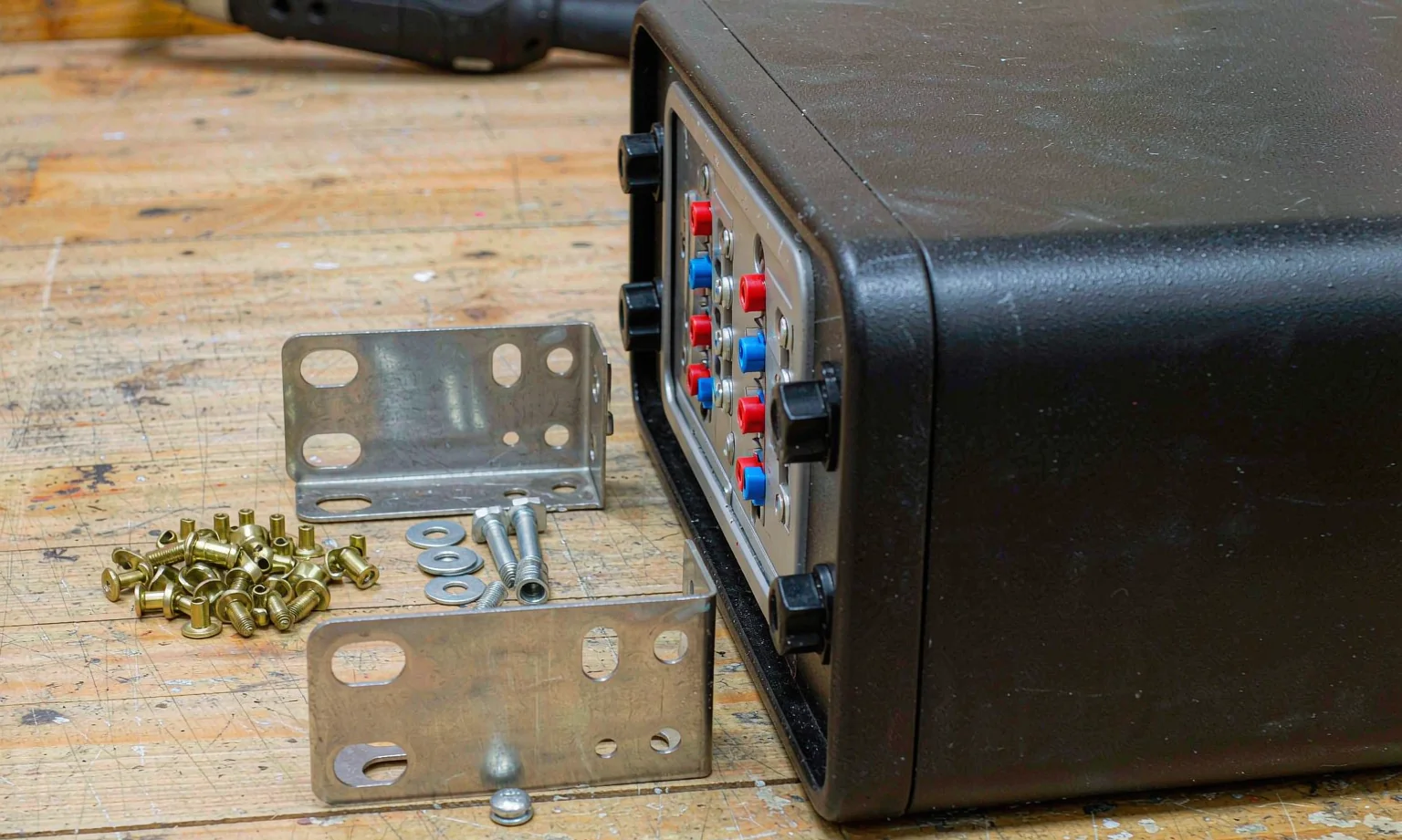 Rack ears with cage nuts and mounting screws for rack chassis