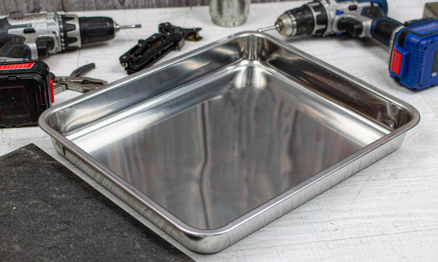 Formed stainless steel drip tray with radiused corners