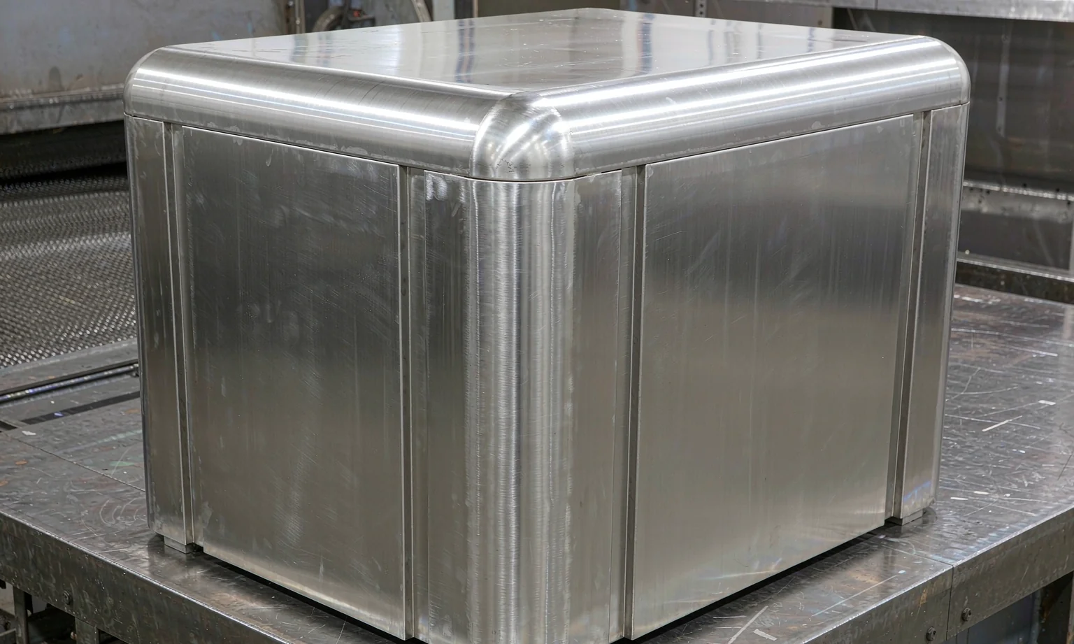 Polished stainless steel enclosure with smooth weld seams