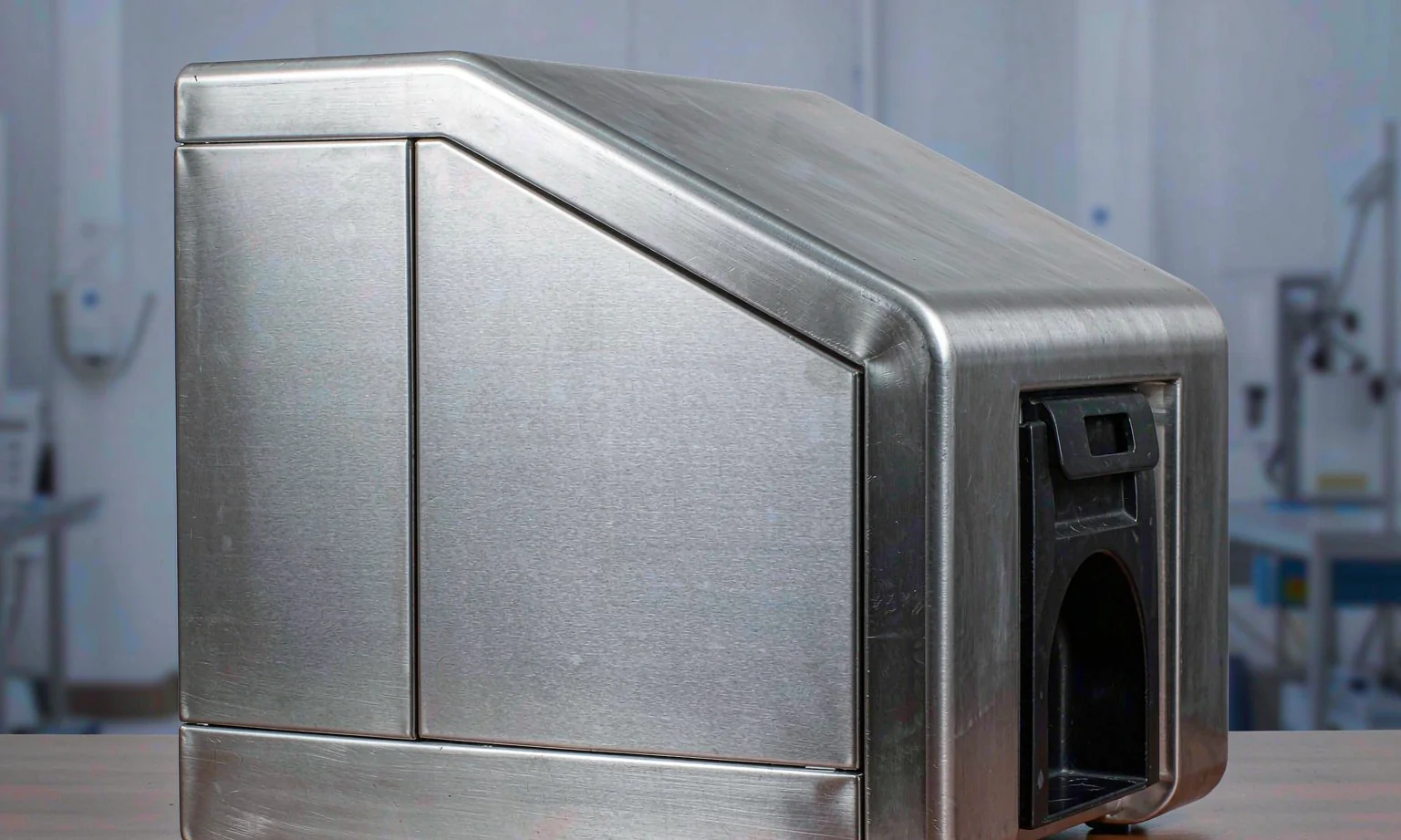 Brushed stainless steel medical housing with rounded corners